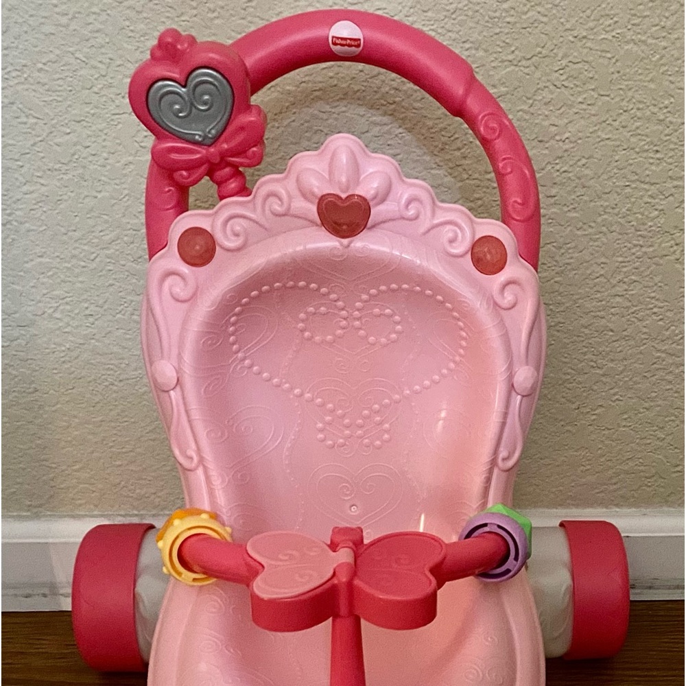 Fisher price lights and sounds stroller for babies.